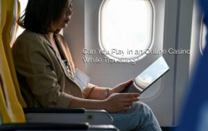 a female traveler uses a tablet during an airplane can you play online casino while travelling gaming betting best online casino malaysia singapore Custom