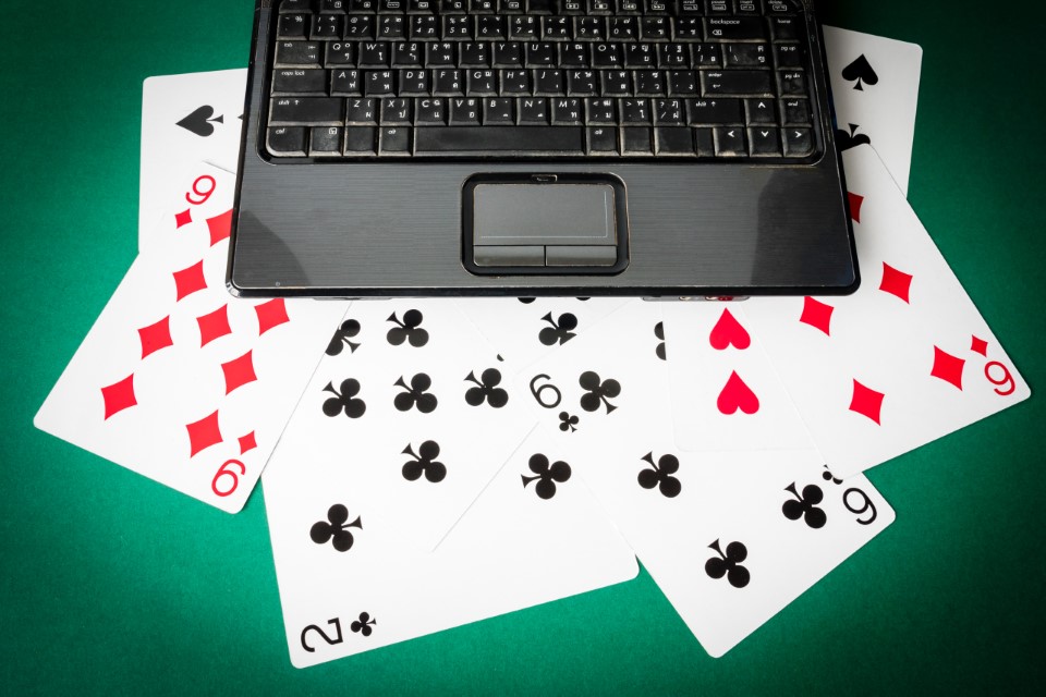 laptop-with-playing-cards-start-gambling-live-online-casino-slot-games-singapore-malaysia